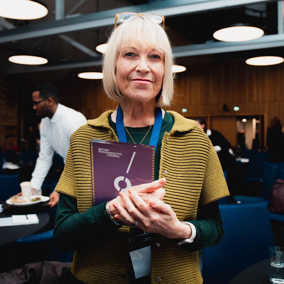 Woman holding PPNow 2024 award.